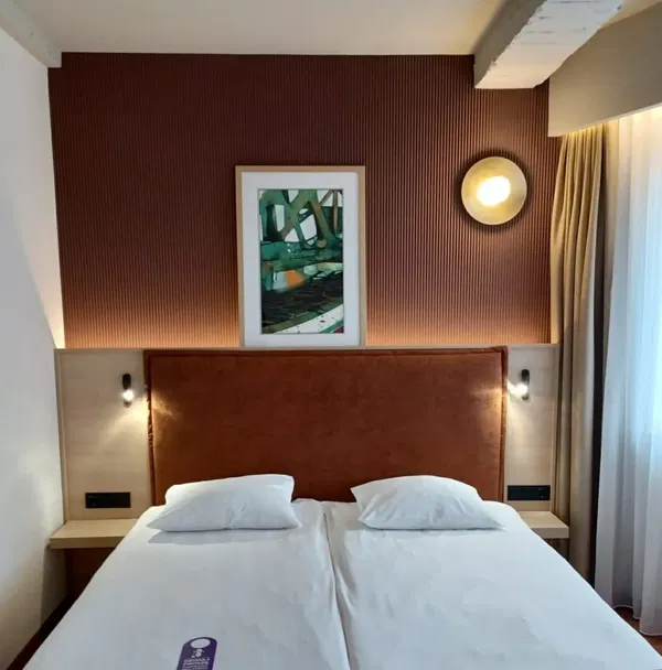 Energická akustika v hotelu Qubus